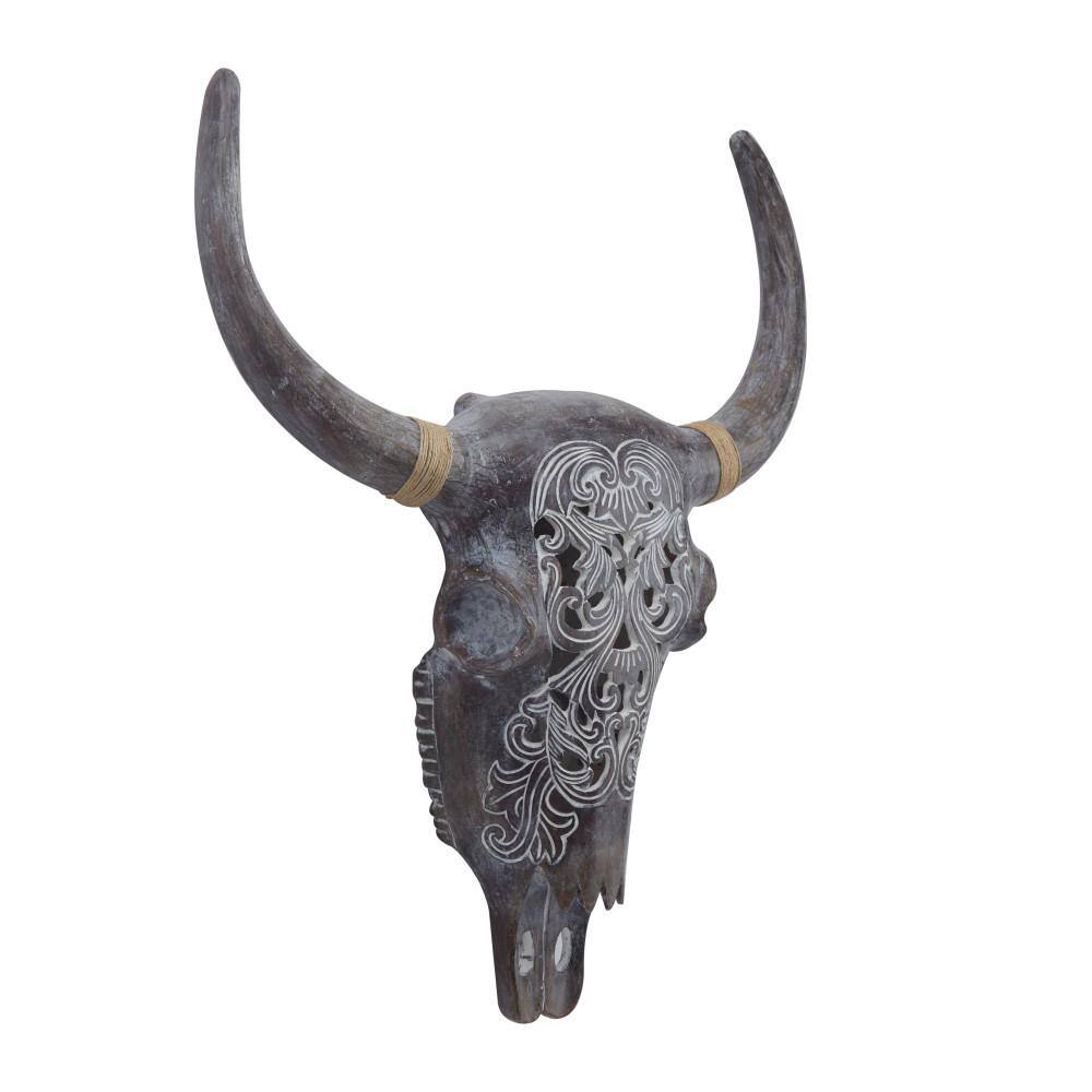 Litton Lane 5 in. H x 23 in. Grey Resin Bohemian Skull Wall Decor